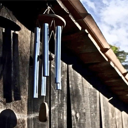 Windchimes to protect wood siding from bees